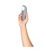 Hand holding a gray Womanizer Starlet 3 clitoral stimulator with white silicone head on a white background.