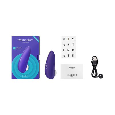 Womanizer Starlet 3 clitoral stimulator in violet with packaging, USB charging cable, manual, and info card on white background.