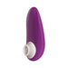 Purple Womanizer Starlet 3 clitoral stimulator with white silicone head and smooth ergonomic design.