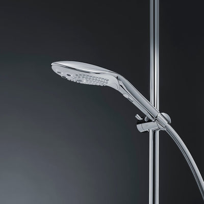 Sleek chrome Womanizer Wave Shower Head Masturbator mounted on adjustable shower rail with flexible hose.