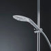 Sleek chrome Womanizer Wave Shower Head Masturbator mounted on adjustable shower rail with flexible hose.
