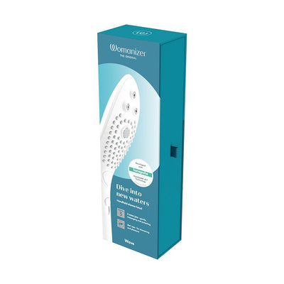 Packaging box of Womanizer Wave Shower Head Masturbator in teal and white with product image and key features displayed.