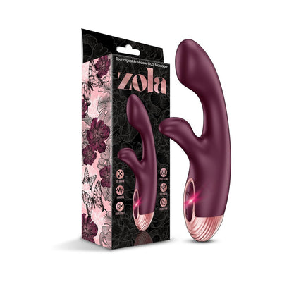 Zola rechargeable silicone dual massager in deep purple with rose gold accents beside its floral and butterfly-themed packaging.