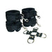 Black adjustable wrist and ankle cuffs with metal clips and a central metal O-ring connector for secure restraint.