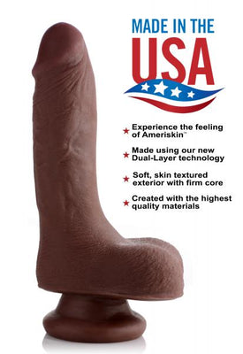 Brown realistic 7-inch dual-layer dildo with suction cup base, textured skin, and firm core made in the USA.