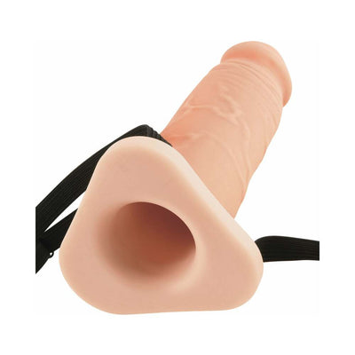 8-inch flesh-colored silicone hollow strap-on extension with adjustable black elastic straps.