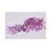 Assorted metallic pink, purple, red, and silver confetti pieces spilling from a clear plastic bag on a white surface.