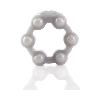 White flexible silicone erection ring with six rounded nodes and a reflective surface beneath.