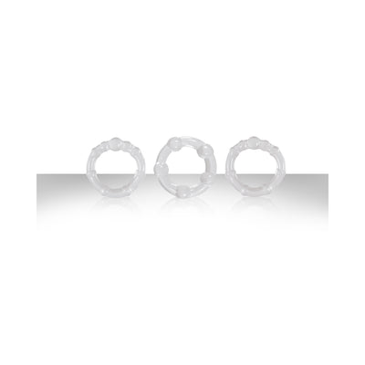 Three clear textured intensity rings made of stretchy material displayed on a reflective surface.