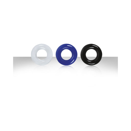 Set of three smooth stamina rings in clear, blue, and black colors displayed on a reflective surface.