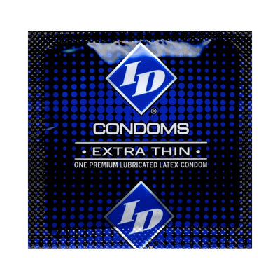Close-up of ID Extra Thin premium lubricated latex condom in blue foil packaging with white text and logo.