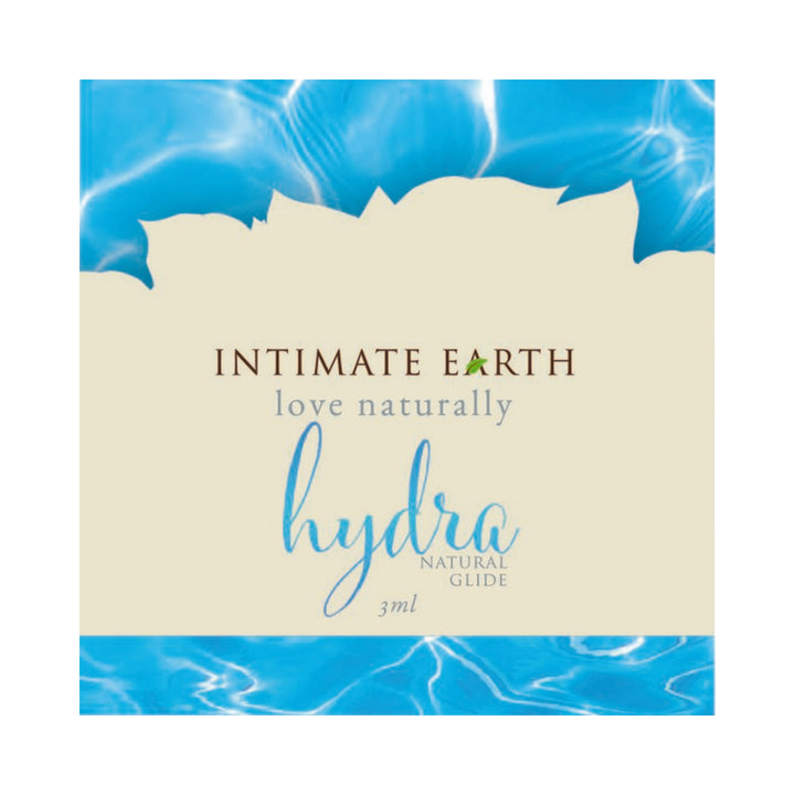 Intimate Earth Hydra Natural Glide 3ml foil packet with blue water design and natural beige background.