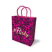 Pink gift bag with black floral pattern and #Flirty text, featuring pink rope handles
