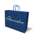Blue gift bag with black floral pattern and gold #Provocative script, featuring blue handles.