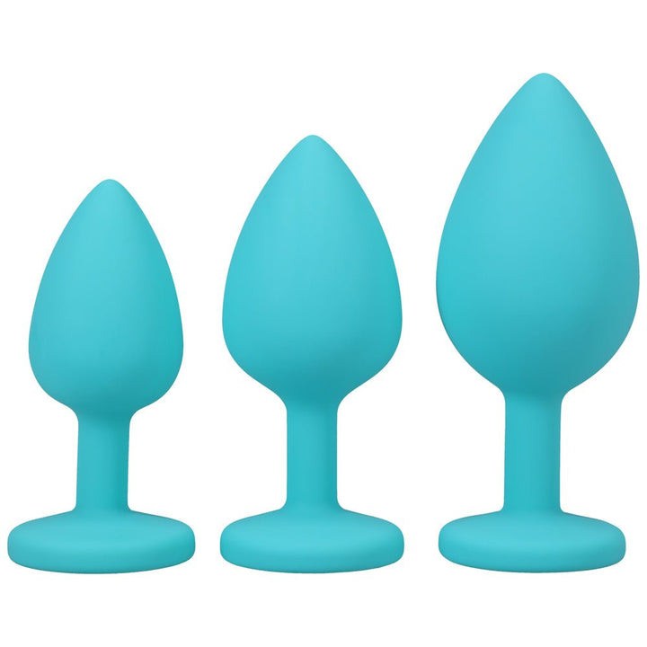 Set of three blue silicone tapered trainer plugs in small, medium, and large sizes with wide bases for safe use.