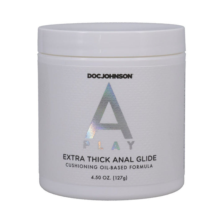 Doc Johnson A Play Extra Thick Anal Glide in a white 4.5 oz jar with cushioning oil-based formula label.