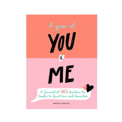 Cover of "A Year of You & Me" couples journal with coral and pink background and playful text design.