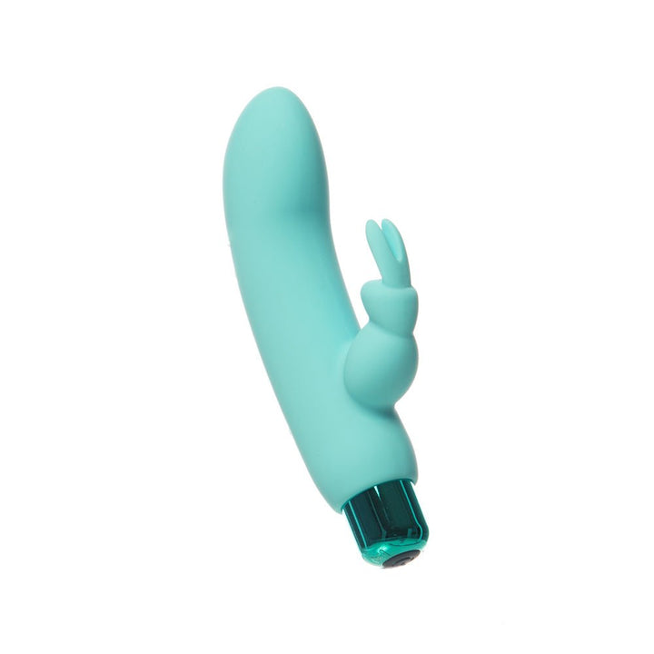 Compact turquoise dual vibrator with removable rabbit sleeve and textured tip, designed for versatile pleasure.