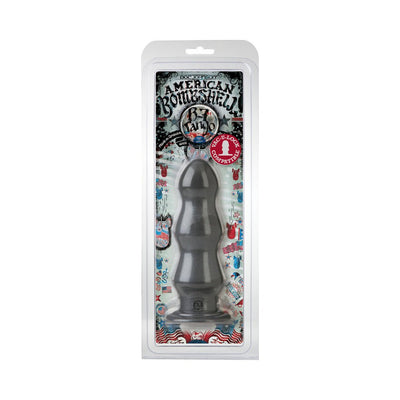 American Bombshell B7 Tango triple ripple design insertable toy in black with flat base, packaged in clear plastic box.