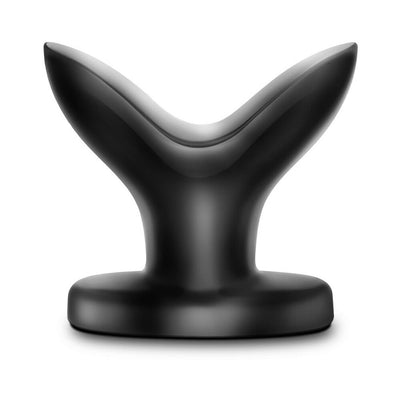 Black flexible anal plug with a wide, split-tip design and a flat base for secure placement.