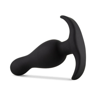 Black curved silicone anal plug with a tapered tip and wide base for secure, comfortable wear.