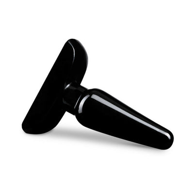 Small black tapered anal plug with a wide base, made from smooth, glossy body-safe PVC.