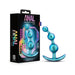 Teal Anal Adventures Matrix Gamma Plug with three rounded beads and curved base next to its black and holographic packaging.