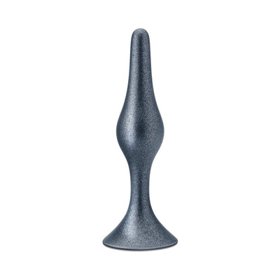 Silver metallic tapered anal plug with flared base and slim flexible stem, designed for comfortable and secure wear.