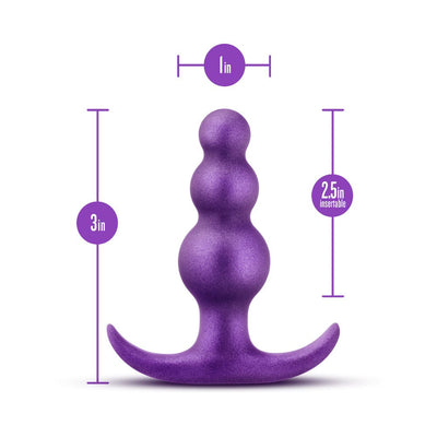 Purple anal plug with three graduated beads and curved flared base, measuring 3 inches long and 1 inch wide.