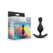 Black silicone Wave Plug with curved base next to its colorful Anal Adventures Platinum packaging box.