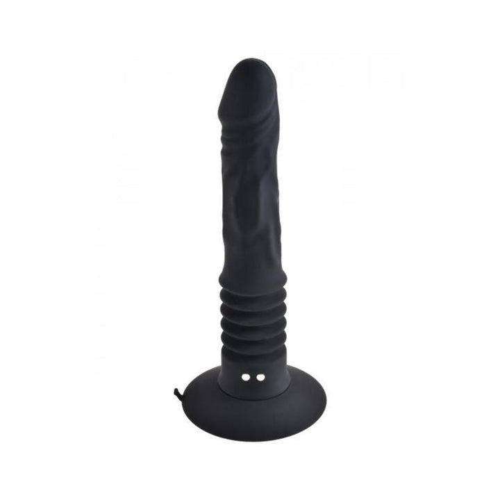 Black textured vibrating anal toy with ribbed base and suction cup for hands-free use.