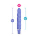 Purple silicone vibrator with spiral design, measuring 6.5 inches long and 1.25 inches wide, with 5.5 inches insertable length.