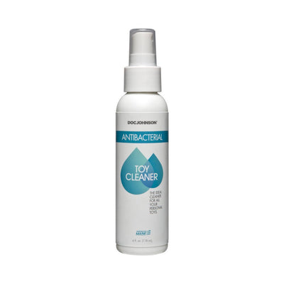 4 oz white spray bottle of Doc Johnson Antibacterial Toy Cleaner with blue label and water drop design