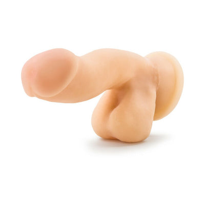 Beige 6.5 inch realistic dildo with dual density texture and suction base on white background.