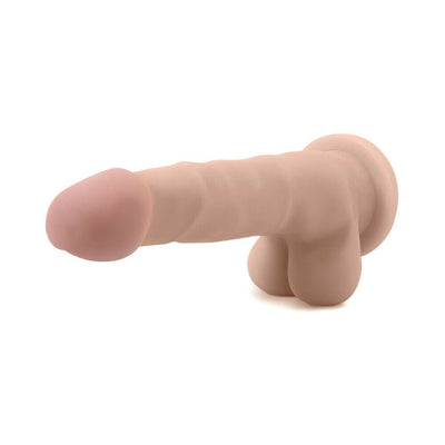 Beige realistic 7-inch dildo with veined shaft, posable design, and suction cup base for hands-free use.