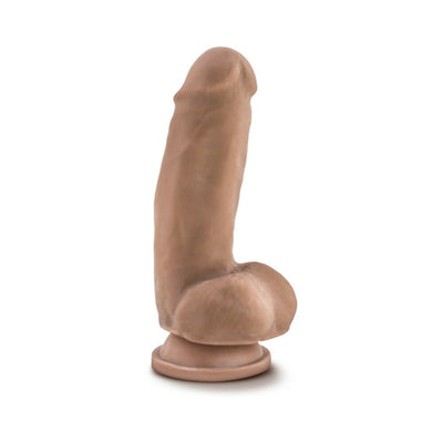 7-inch realistic Latin skin tone dildo with suction cup base, flexible and lifelike texture.