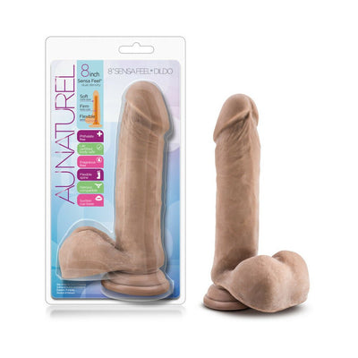 8 inch Au Naturel Sensa Feel dual density dildo with flexible spine and suction cup base in natural skin tone next to packaging.
