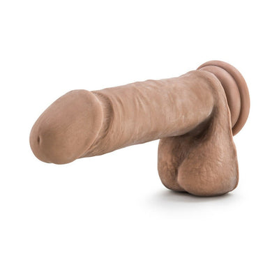 Realistic 8-inch dual density dildo with flexible spine and detailed texture in natural skin tone on white background.
