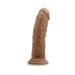 Realistic 8-inch vanilla-colored dildo with textured surface and strong suction cup base for hands-free use.