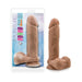 Au Natural 9.5 inch realistic dildo with suction cup base displayed next to its packaging.