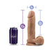 Realistic 9.5 inch dildo with suction cup and 2 inch diameter next to a purple can for size comparison.