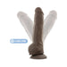 Flexible vanilla-colored dual density dildo with suction base, shown bending to highlight flexible spine feature.