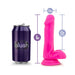 Pink 6-inch Au Naturel Bold Delight dildo with suction base next to a purple Blush soda can for size comparison.