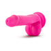 Pink realistic dildo with suction cup base and textured surface for versatile use and comfort.