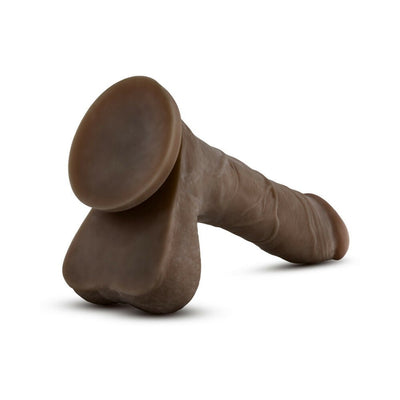 Realistic brown silicone dildo with suction base and detailed texture, designed for versatile use and comfort.