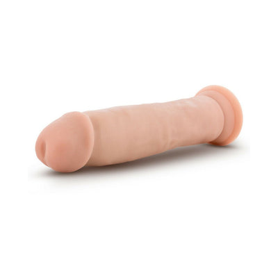 Beige 9.5-inch realistic magnum dong with suction cup base, soft exterior and firm core for lifelike feel.