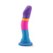 Colorful silicone dildo with curved design and suction cup base in purple, yellow, pink, and blue segments.