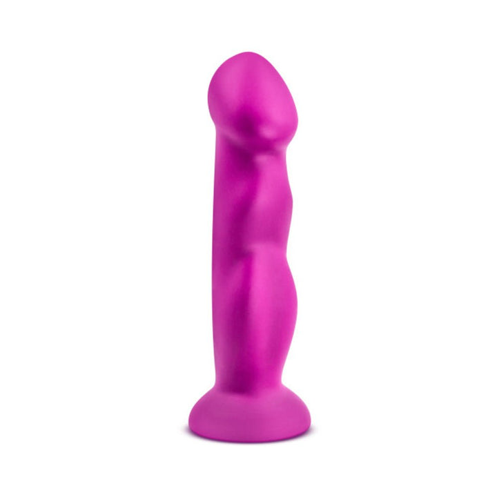 Vibrant violet dual-density silicone toy with textured curves and suction cup base for versatile use.