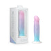 Blush Avant D17 Lucky dildo in pink, blue, and purple gradient with suction base next to its white packaging box.