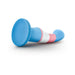 Blue, pink, and white silicone pride-themed curved toy with suction cup base on white background